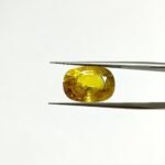 10.12 carats Yellow Sapphire Thailand ( 11.25 ratti )